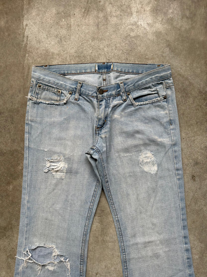 BOOTCUT DISTRESSED DENIM